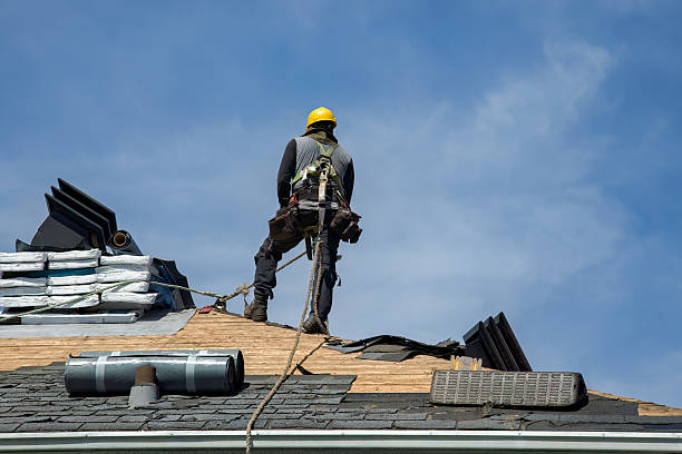 Professional Roof Replacement technician working in Coldwater, KS